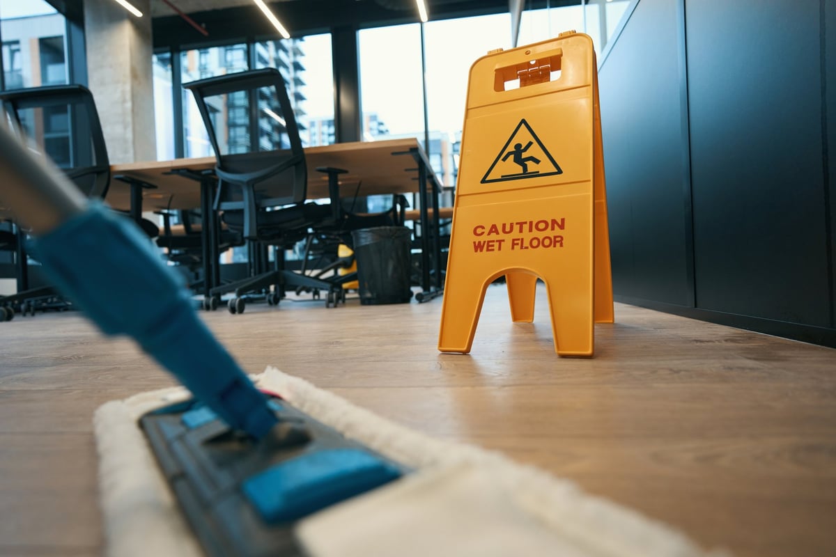 Cleaning tools and a folding step ladder ready for a home clean